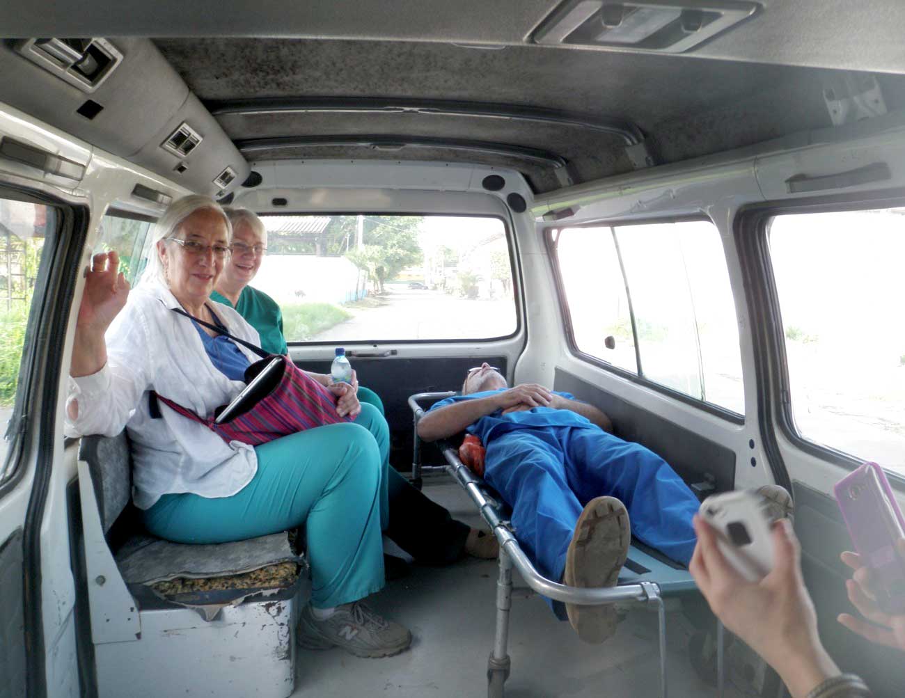 Madre y Niño participants in an old and nearly empty ambulance